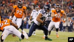 Поединок по американскому футболу между Seattle Seahawks и Denver Broncos